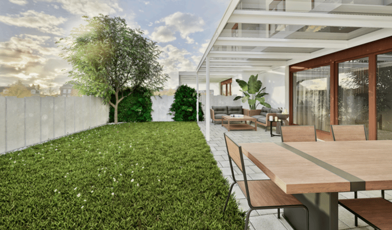 Outdoor living area with dining table, chairs, couch, glass walls, fence, and green lawn