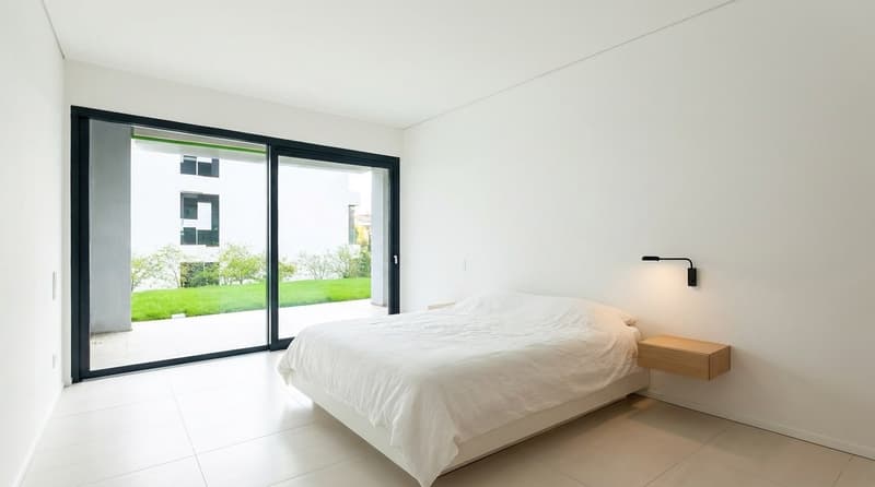 Monteggio | 2.5 a Reddito già affittato | moderno con giardino privato (3)