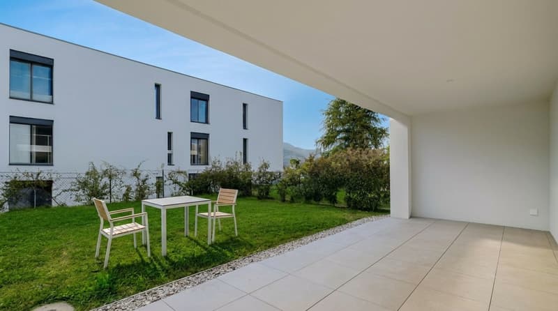 Monteggio | 2.5 a Reddito già affittato | moderno con giardino privato (4)