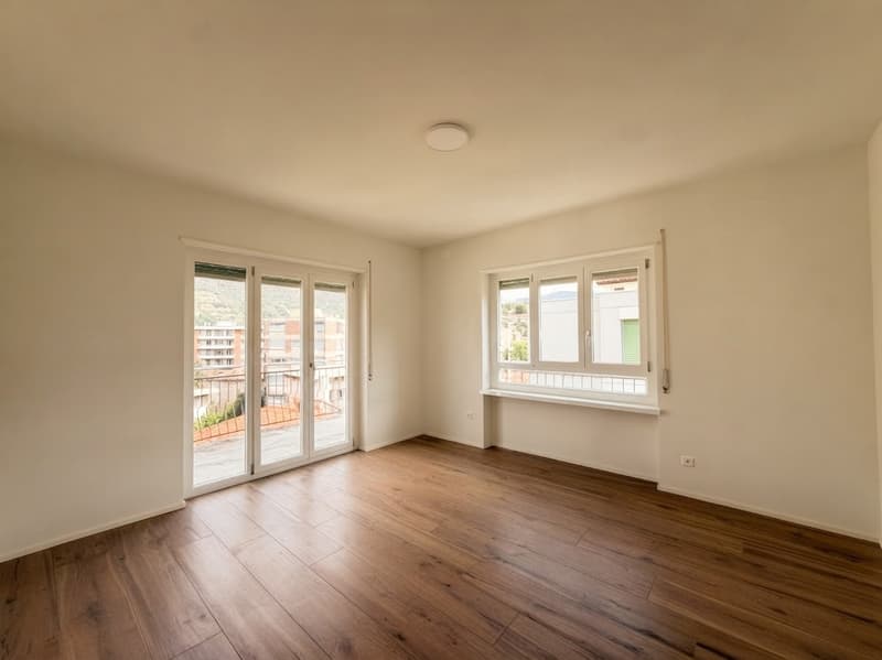 CHIASSO | Ampio appartamento di 7 locali con grande balcone (8)