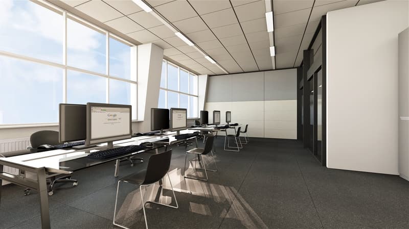office room, desks with monitors, office chairs, large windows