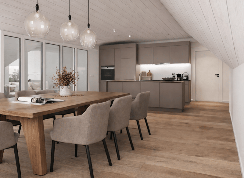 Dining area with wooden table, chairs, and modern kitchen with appliances and cabinets
