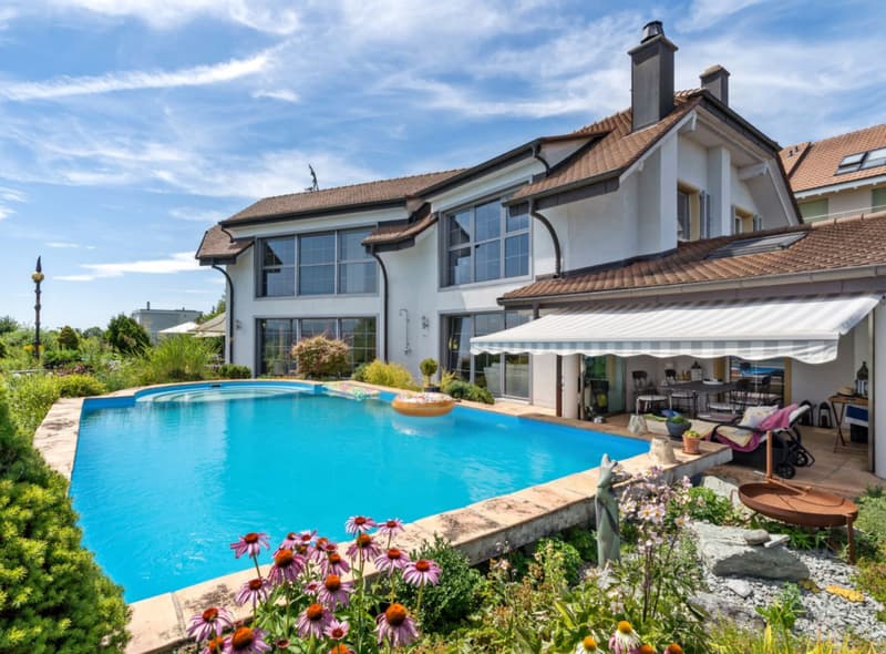 7.5-Zi.-Terrassenhaus mit Pool und Seesicht in Bellerive kaufen (1)