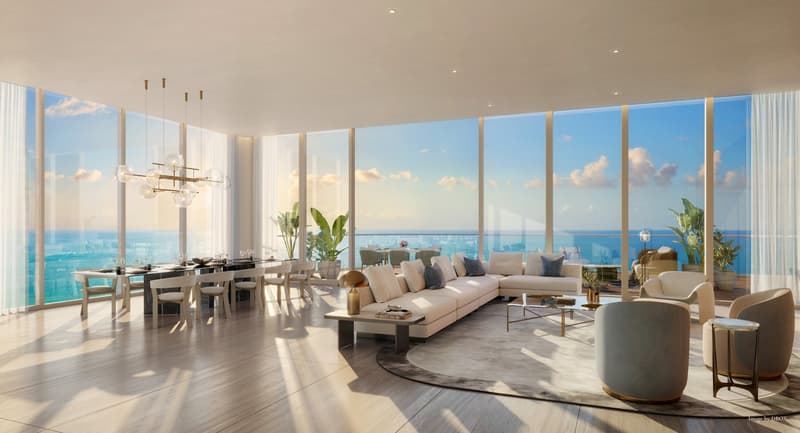 modern living room with large windows, wooden floor, white couch, dining table, chandelier, ocean view