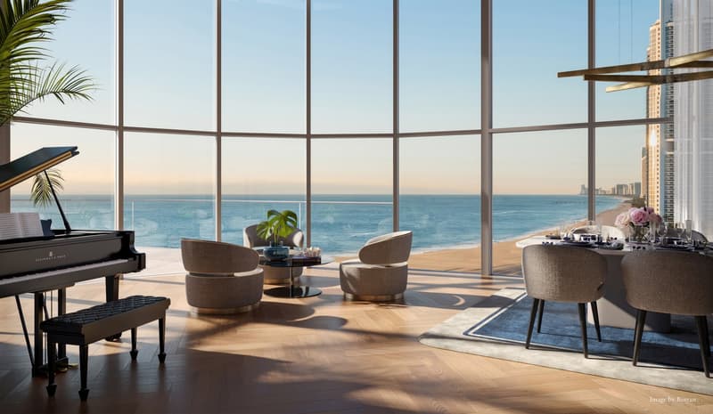 modern living room with a grand piano, round table, chairs, and a dining table with flowers