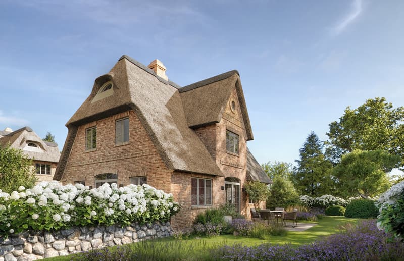 2 story house, brick, thatched roof, garden, outdoor seating, trees