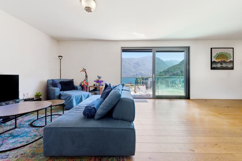 Exclusive penthouse with panoramic rooftop and breathtaking views over Lake Lugano (2)