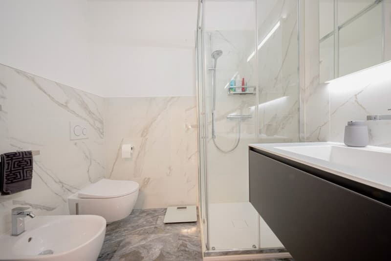 Elegante maisonnette avec double jardin à Montagnola (12)