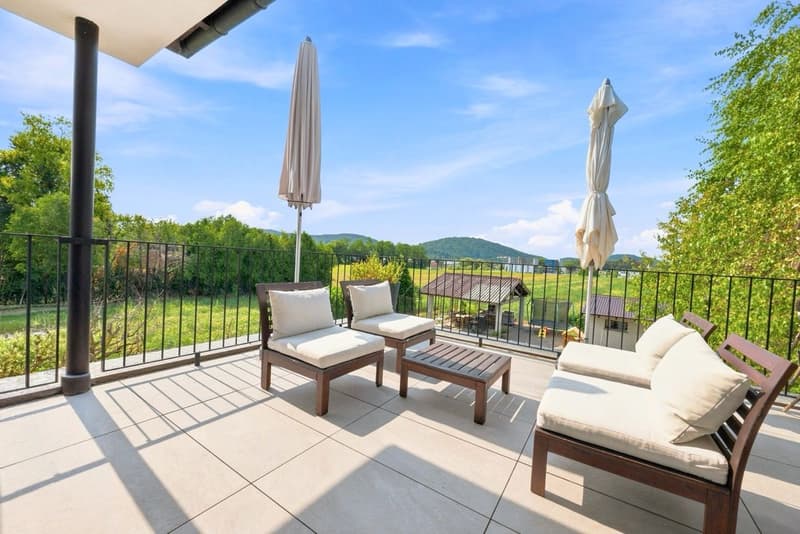 Affittasi appartamento di 4.5 locali in casa bifamiliare con giardino (1)