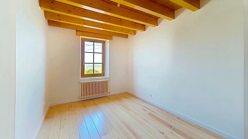 empty room, wooden floor, white walls, wooden ceiling, window, radiator