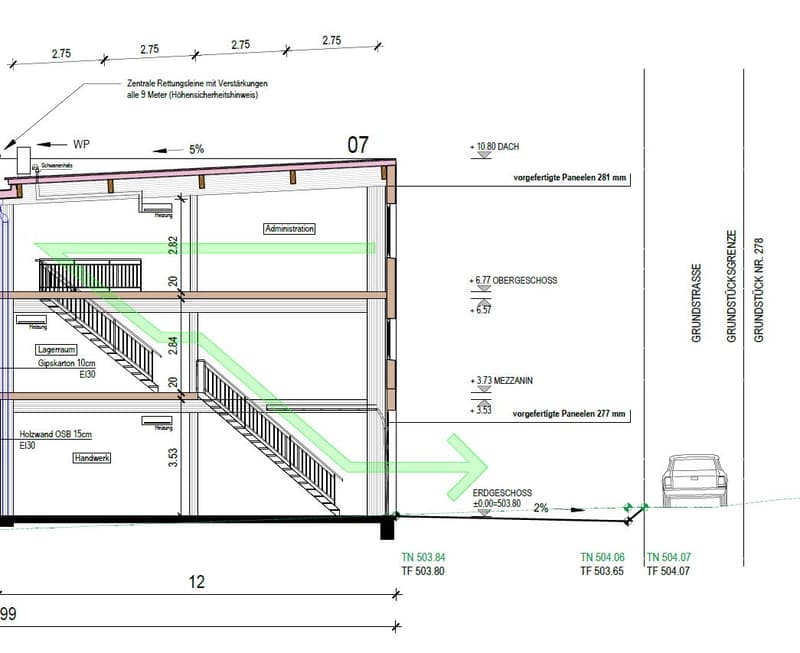 The image shows a floor plan with a main building and an adjacent parking area. The main building has an administration area, a storage room, and a mezzanine level. The building has a balcony or terrace, and there is a designated parking space nearby.