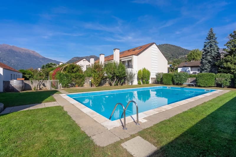 Casa d'angolo a schiera di 5 locali con piscina a Ponte Capriasca (1)