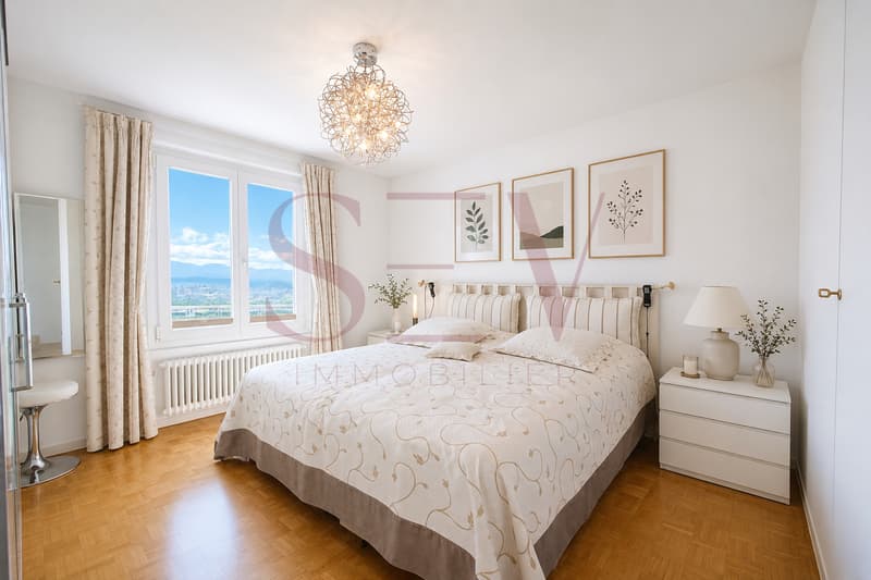 Chambre parentale avec armoire encastré et magnifique vue lac