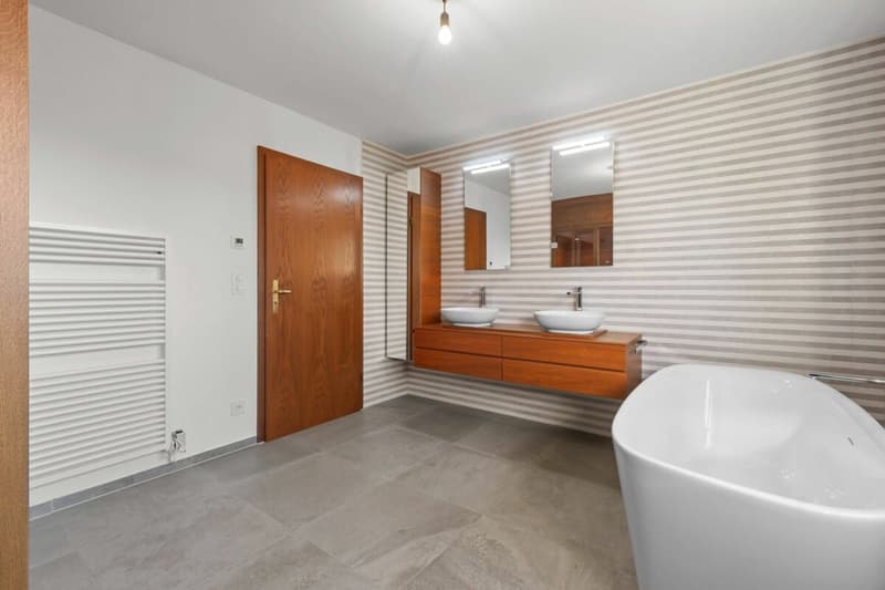 Maisonettewohnung mit Cheminée, Gartensitzplatz und 2 Aussenparkplätzen! (10)