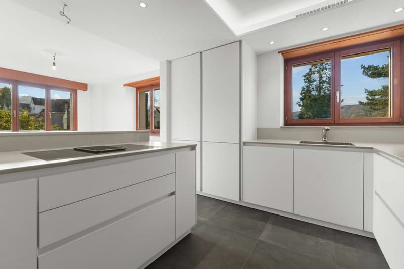 Maisonettewohnung mit Cheminée, Gartensitzplatz und 2 Aussenparkplätzen! (4)