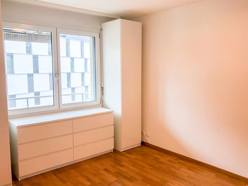 Joli appartement de 2,5 pièces situé proche du centre-ville et des commodités. (6)
