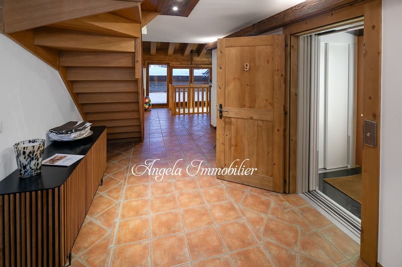 wooden stairs, wooden door, tiled floor, wooden wall, black shelf, white wall