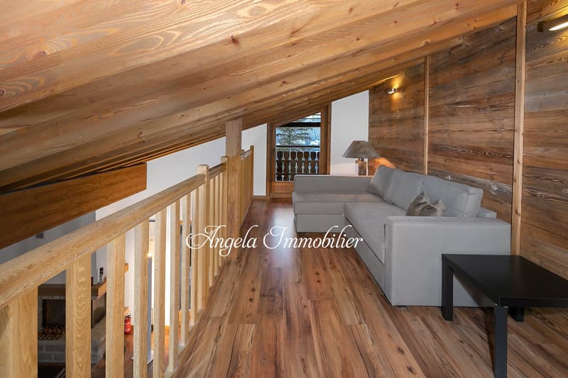 wooden ceiling, wooden walls, wooden floor, sofa, lamp, fireplace