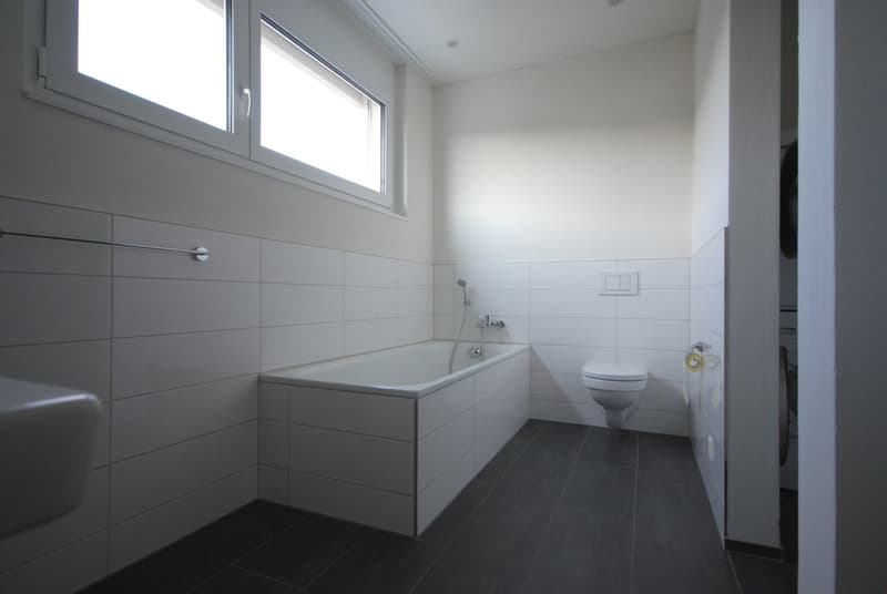 Badezimmer mit Wanne & WC