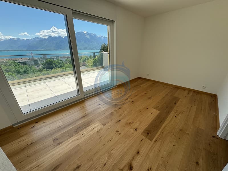 APPARTEMENT DE 2,5 PIÈCES EN ATTIQUE AVEC VUE PANORAMIQUE SUR LE LAC (5)