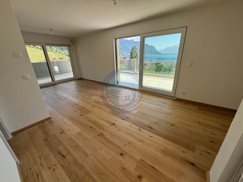 APPARTEMENT DE 2,5 PIÈCES EN ATTIQUE AVEC VUE PANORAMIQUE SUR LE LAC (3)