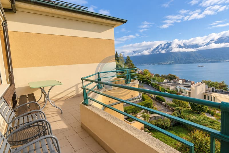 SPACIEUX APPARTEMENT DE 4,5 PIÈCES AVEC VUE PANORAMIQUE SUR LE LAC (13)