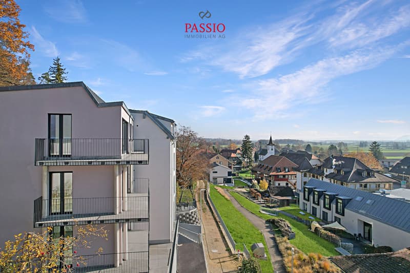Habitation moderne avec vue panoramique : Appartement neuf de 3.5 pièces à Gampelen (1)