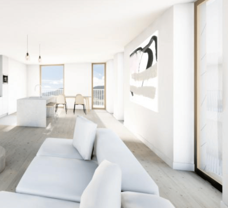 Bright and airy living room with large windows, white walls, light hardwood floors, white sofa, and abstract artwork on the wall