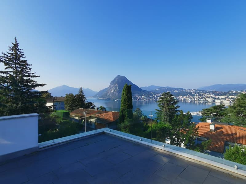 Attico con vista sul golfo di Lugano situato a Suvigliana/Ruvigliana (1)