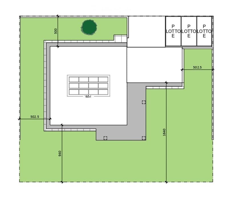 The image shows a floor plan with a large open space, three parking lots, and a circular green area. The main space appears to be a warehouse or industrial facility, with no specific room names indicated.