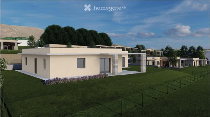 Single-story modern houses with flat roofs, large windows, and landscaped gardens. The houses have a uniform design with a neutral color scheme and stone accents. There are trees and shrubs planted around the houses, and a grassy lawn in the foreground.