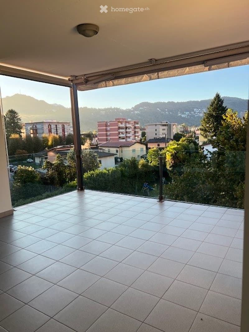 large terrace, tiled floor, panoramic city view