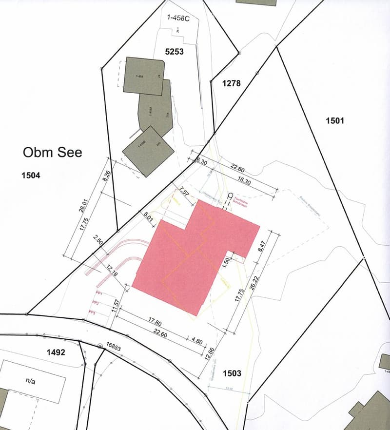 Floor plan with various labeled sections and measurements, including dimensions and plot numbers.
