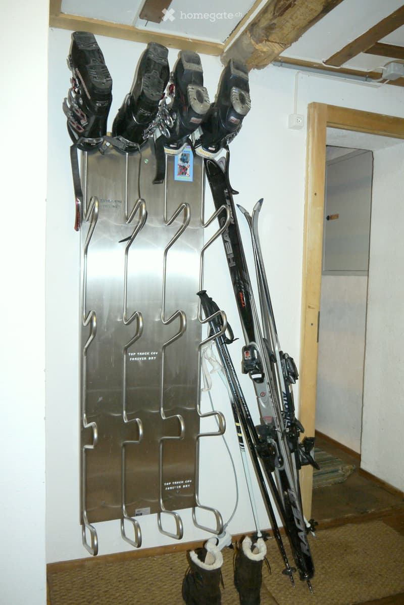 Ski rack for skis, ski boots and ski poles