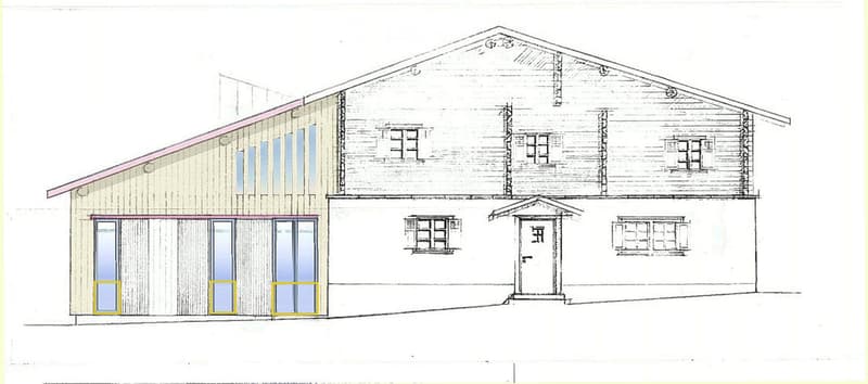 House design, raised ground floor, balcony, 3 large windows at the front, large entrance door.