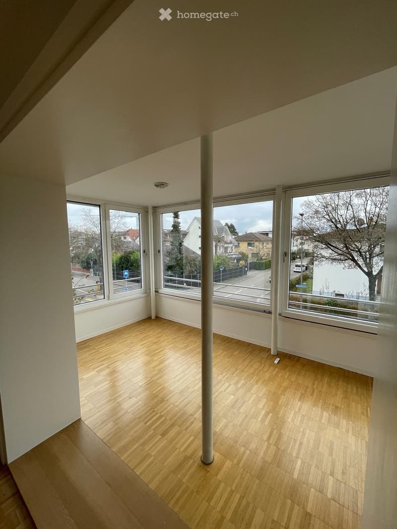 large windows, wooden floor, large open space, pillar