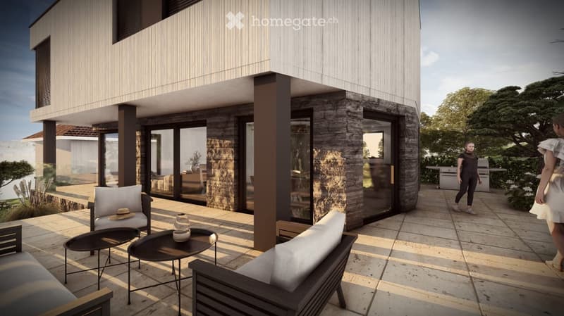Contemporary design, open patio, large glass windows, natural stone pillars, two sitting chairs with cushions, round table, woman walking on the patio.