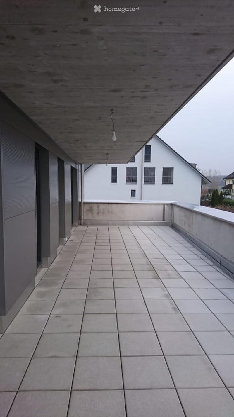 Balcony / Terrace with tiled floor and a small ledge with drainage