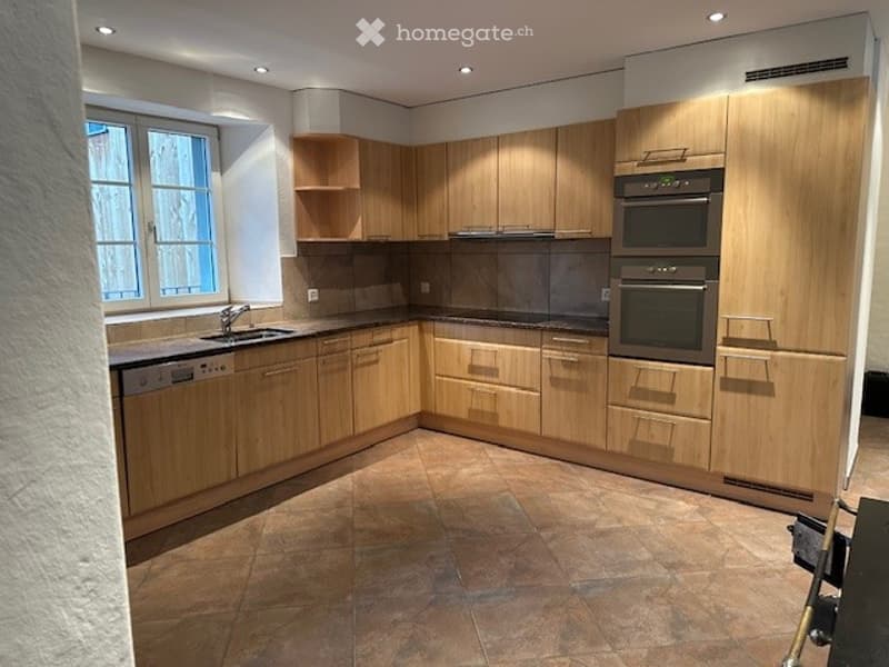 modern kitchen, wooden cabinets, granite countertop, sink, oven, dishwasher, built-in appliances, tiled flooring