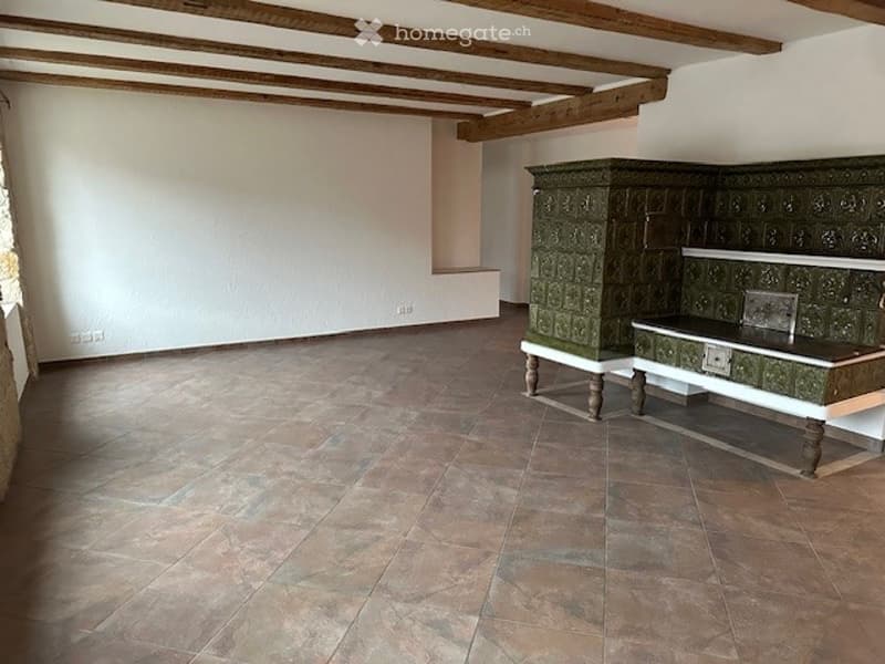 empty room, wooden beams, wooden floor, fireplace, electrical outlets