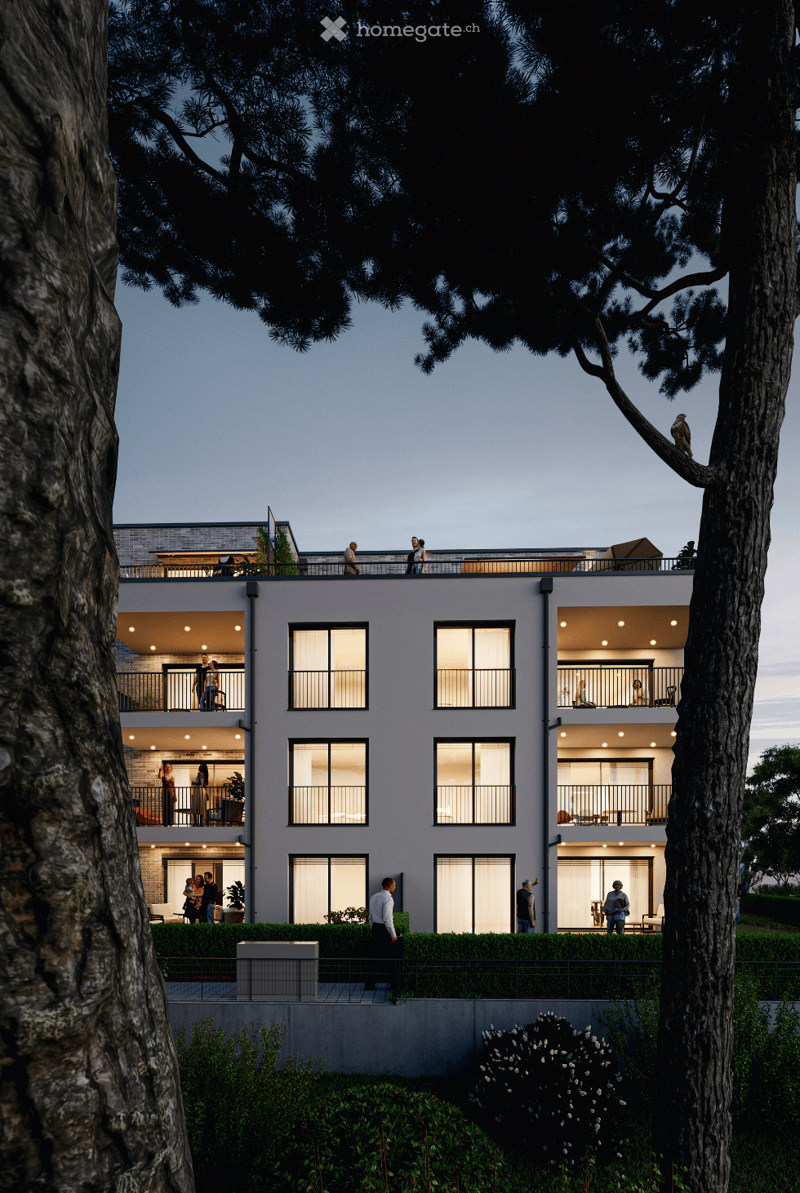 Modern architectural design, raised ground floor, several balconies, greenery, residential building