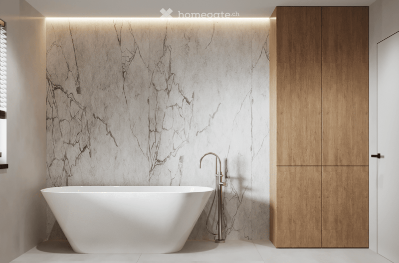 Marble tiled walls, white bathtub, wooden cabinet, white window, silver faucet