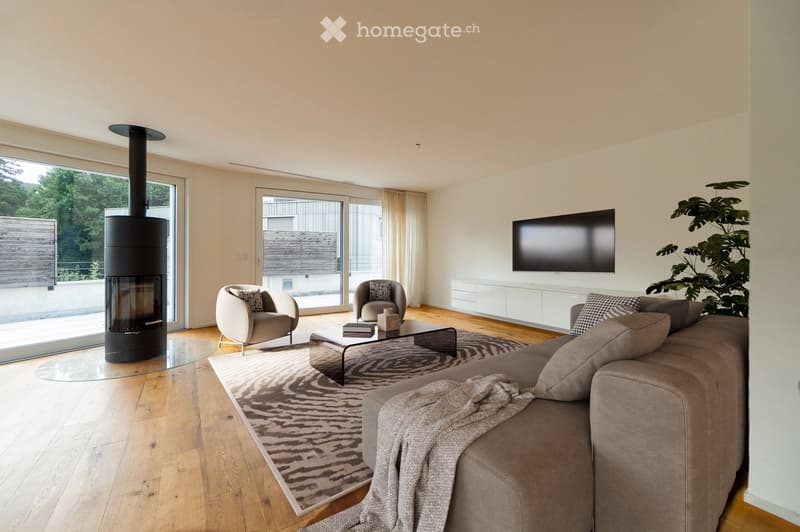 modern living room with fireplace, large windows, wooden floor, couch, coffee table, armchairs, rug, TV