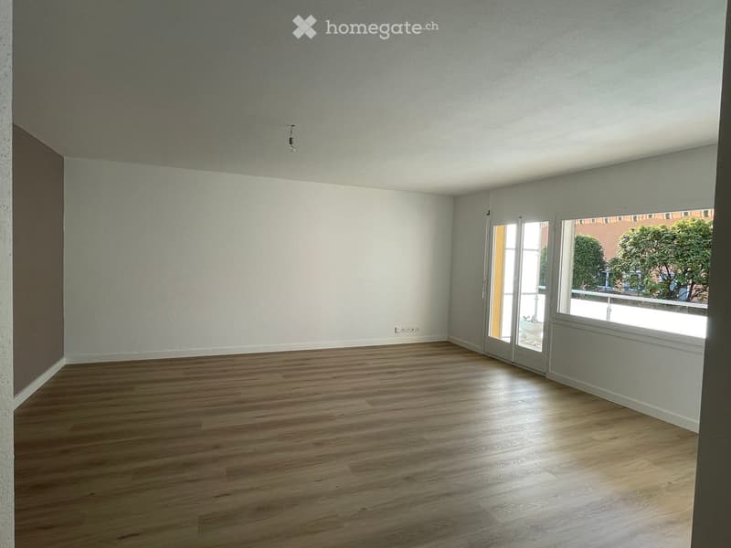 wooden floor, large windows, empty room