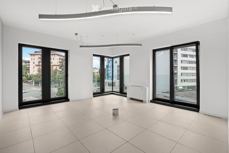 Three large windows, balcony, modern lighting, tiled floor, modern decor