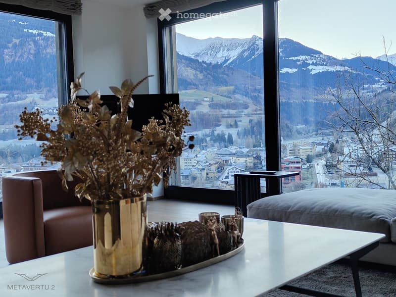 big windows with mountain view, modern design, couch, coffee table, TV