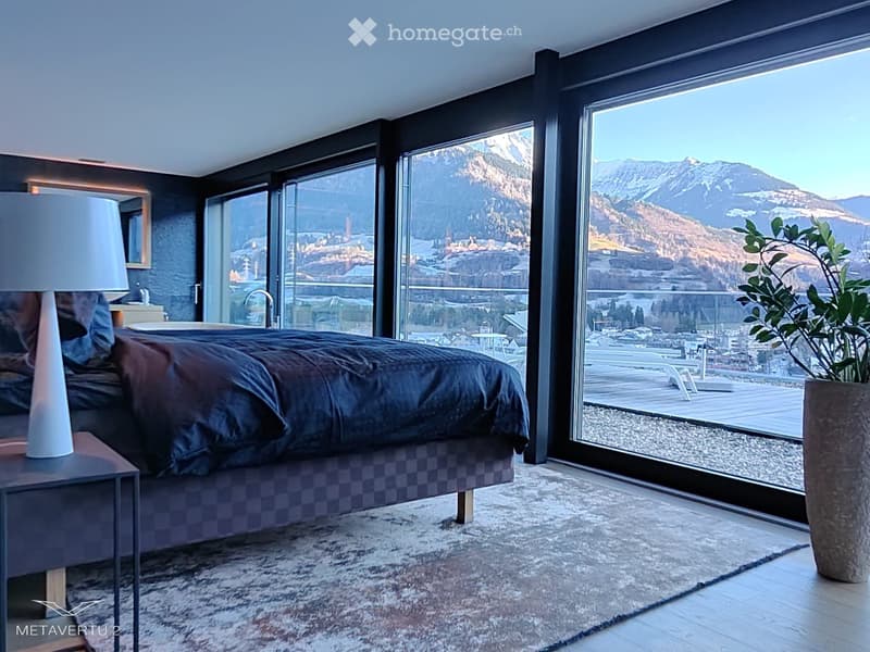 {"visible_features": ["Balcony / Terrace", "View"],    "type": "Room",    "description": "Large bedroom with balcony, large bed, lamp, carpet, large windows, city and mountain view",    "localized_descriptions":        {        "EN": "Large bedroom w