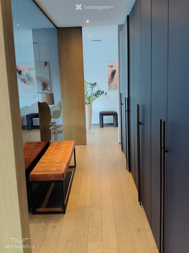 Corridor, wooden floor, mirrors, benches, plant, cabinets