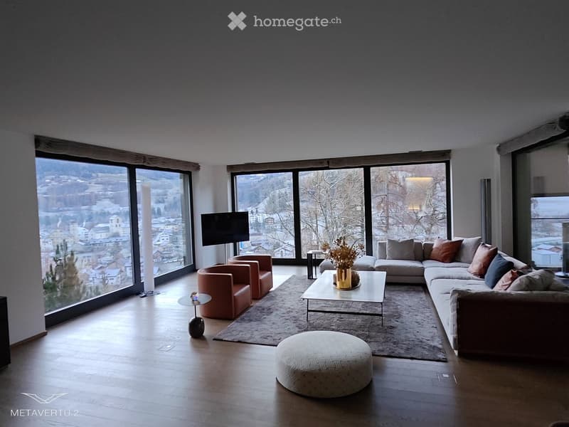 wood floor, large windows, sofas, armchairs, coffee table, carpet, side table, television