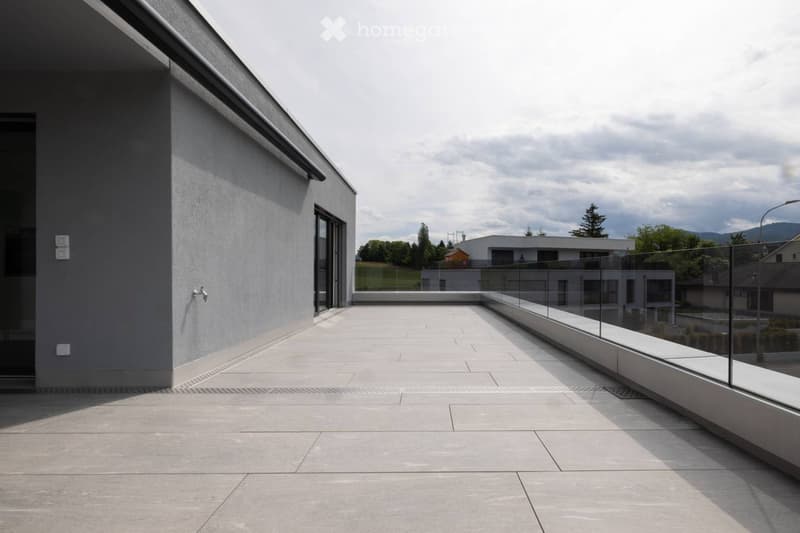 large terrace, gray walls, clear view, modern design